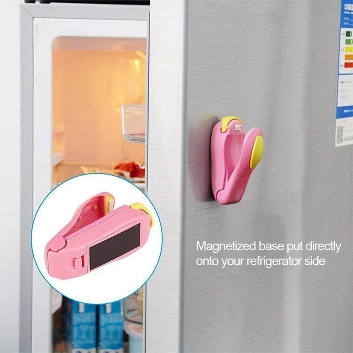 A person using a mini food sealer to re-seal an open bag of chips, highlighting convenience and freshness.