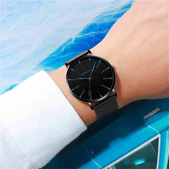Men's quartz analog watch with a minimalist black design & eco-friendly vegan leather for timeless style.