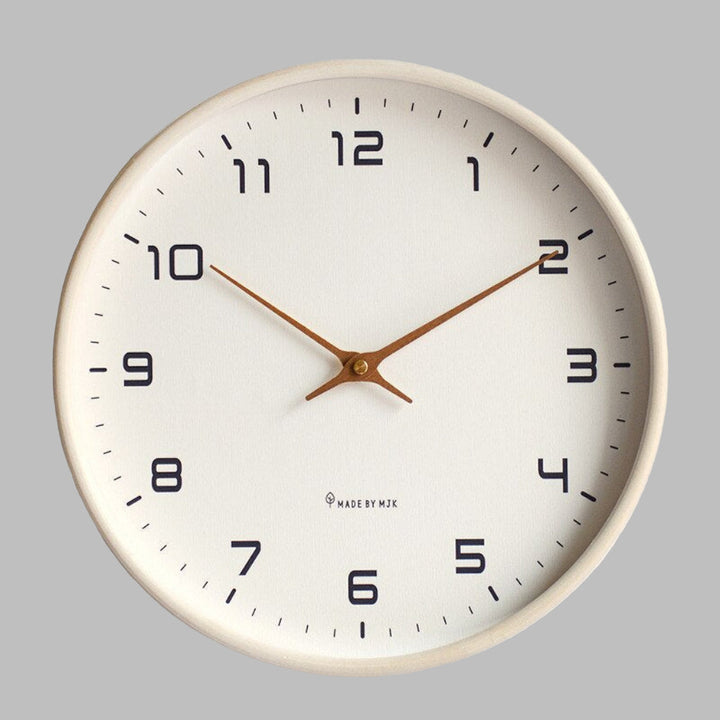 Silent cream wood minimalist wall clock with quartz movement, ideal for bedroom, office or modern home decor.