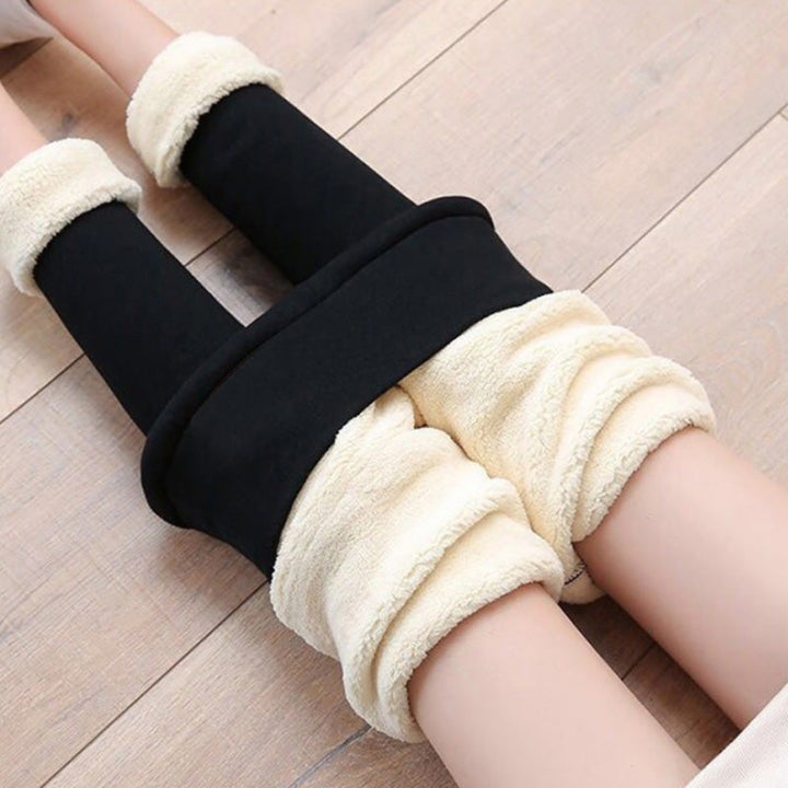 Front view of black high-waisted thermal fleece-lined leggings for women, ideal for cold weather