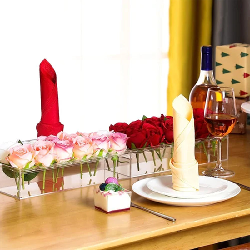 Acrylic flower vase filled with vibrant blooms, ideal for modern home interior design and special events.