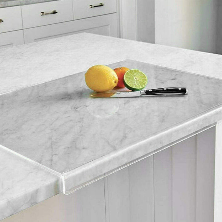 Modern clear acrylic non-slip cutting board for safe kitchen food prep and stylish serving.