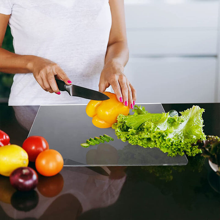 Elegant clear acrylic non-slip serving board, perfect for presenting cheeses & appetizers in a modern kitchen.