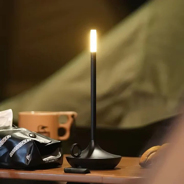 Easy-to-use dimmable LED touch table lamp, modern portable design, rechargeable for wireless ambient lighting.