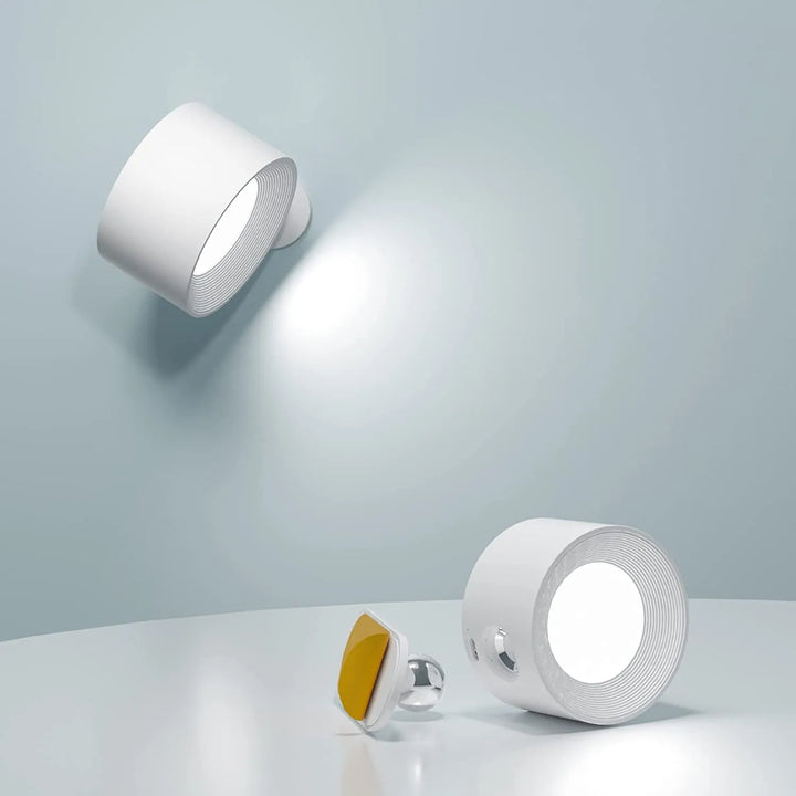 Modern LumoFlex wireless LED wall lamp, rechargeable & dimmable for versatile home lighting & decor.