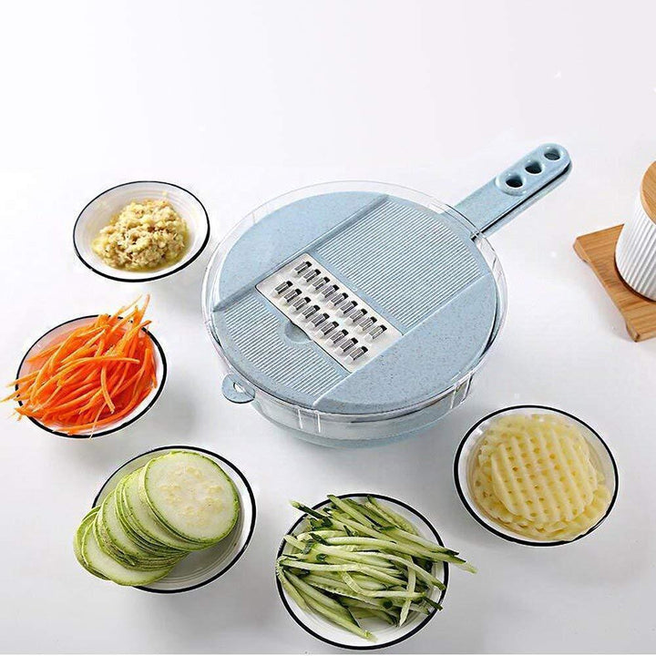 Collection of sliced vegetables (onions, potatoes, cucumbers) prepared using the versatile slicer.