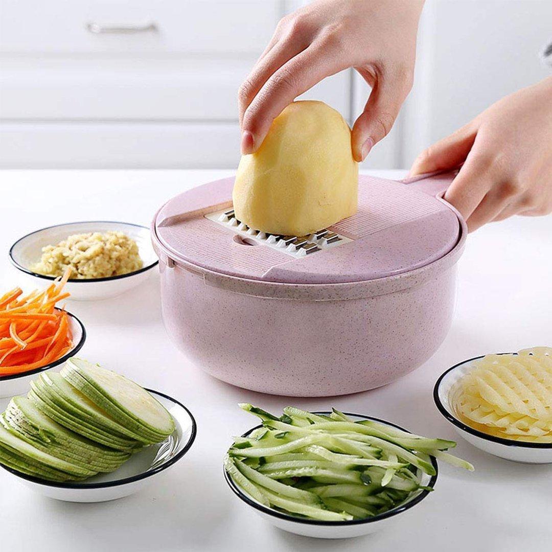 Compact and easy-to-store multi-function vegetable chopper with all attachments for small kitchens.