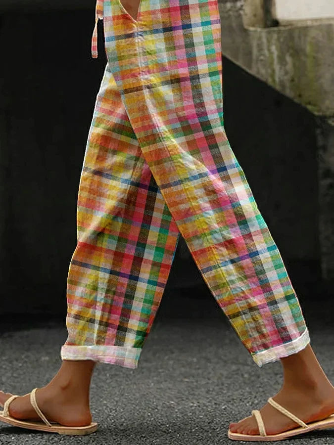 Casual women's multicolor plaid linen pants with elastic drawstring waist for a relaxed, comfortable summer look.