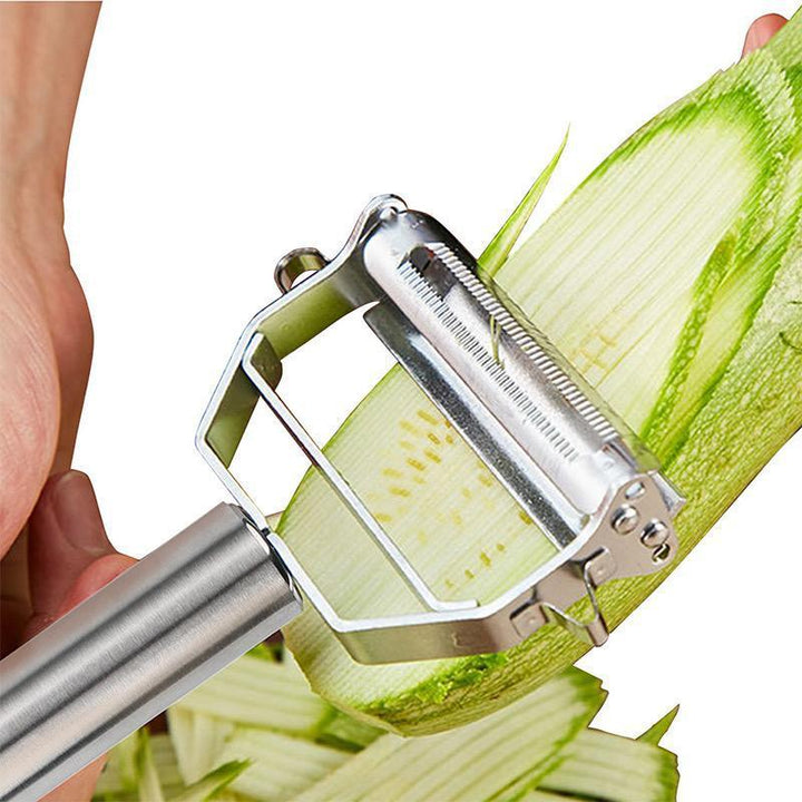 Close-up of a durable stainless steel multifunction peeler and julienne slicer for easy meal prep.