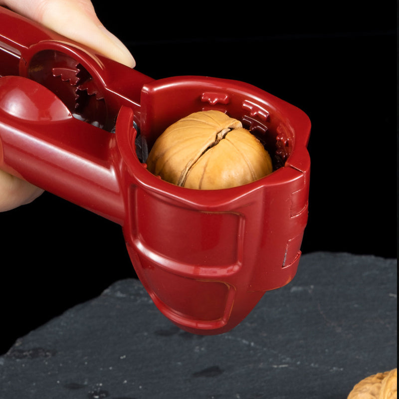 Manual metal nutcracker sheller, versatile kitchen tool for almonds and hazelnuts. Strong and durable.