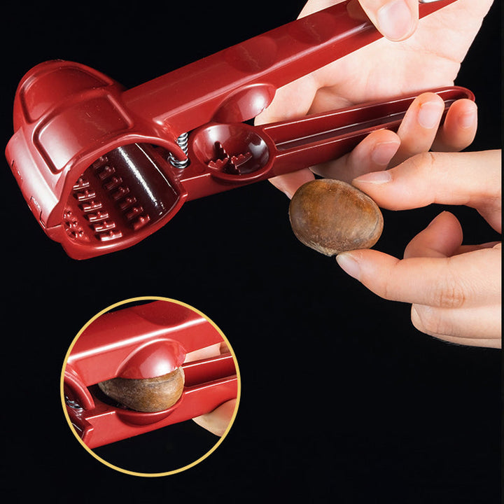 Ergonomic metal nutcracker for easy nut shelling. Household kitchen tool, perfect for all nut types.