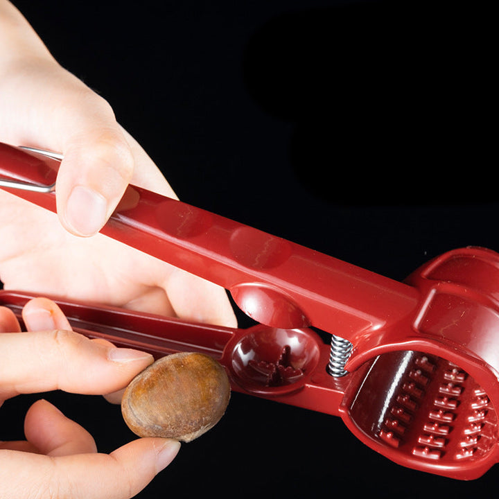 Multifunction nutcracker kitchen tool, sturdy metal construction for cracking walnuts, pecans, and more.