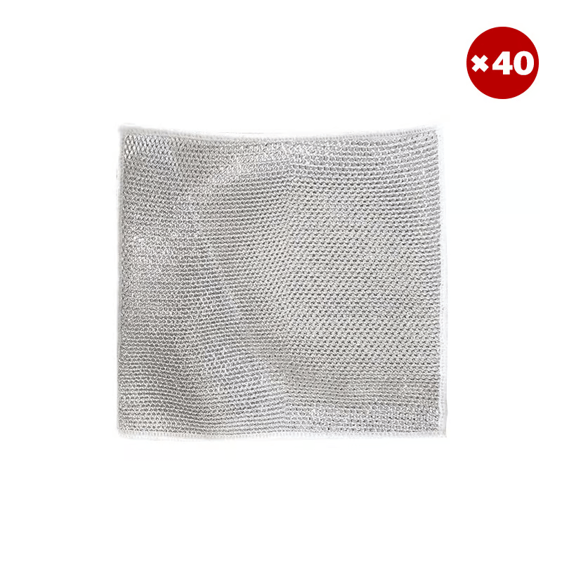 Wire cleaning cloth tackling baked-on food on a tray, an ultimate kitchen power scourer