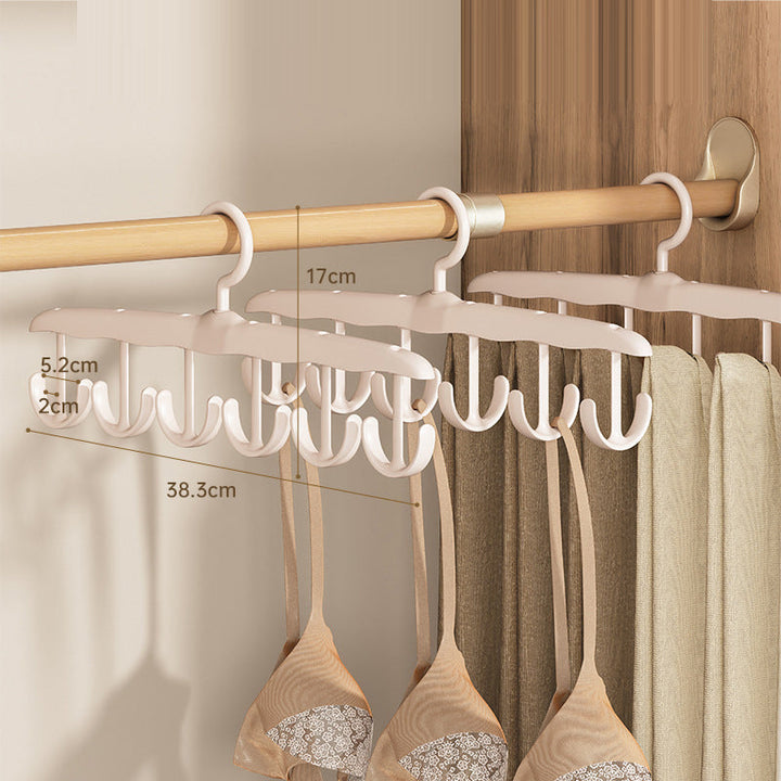Efficient plastic hanger with swiveling hook, perfect for maintaining an organized closet space
