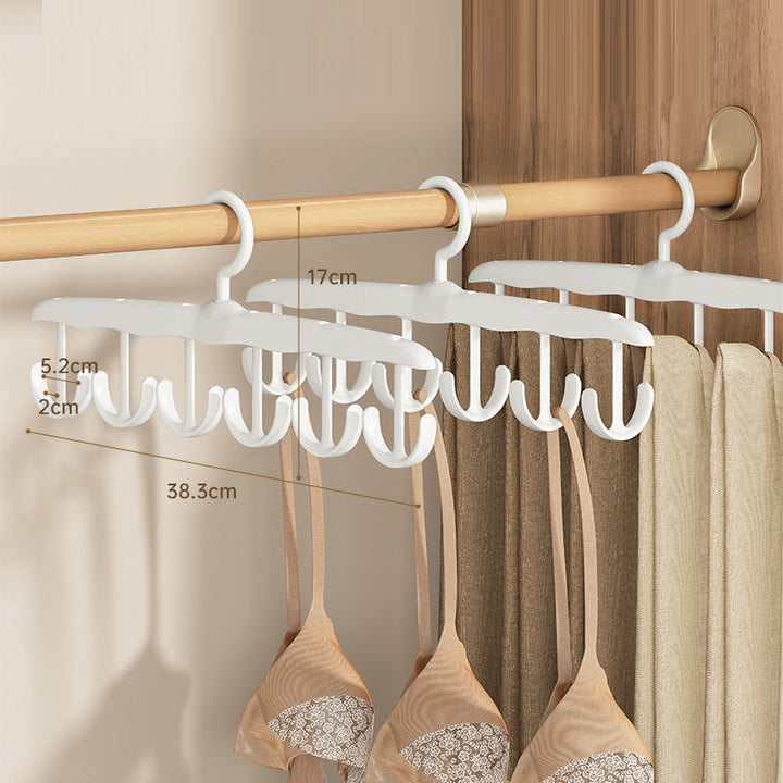 Practical plastic garment hanger with a rotating hook, making laundry and closet tasks easier