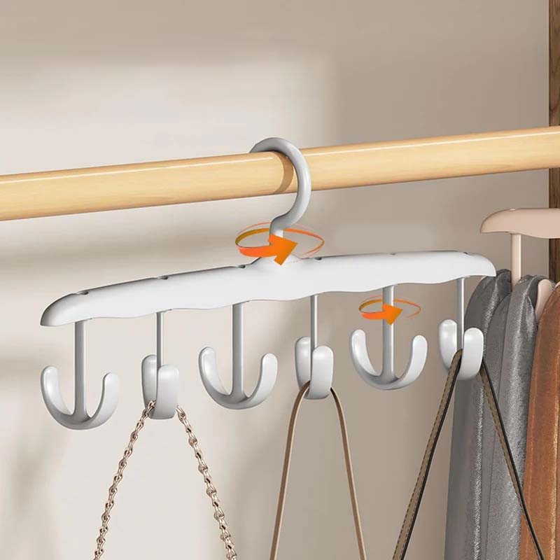 Ergonomic multifunctional plastic hanger, optimizing wardrobe space with its rotating hook