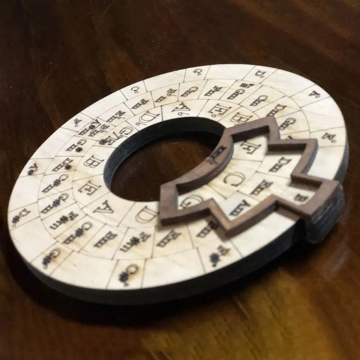 Close-up of the Wooden Melody & Chord Tool showing engraved musical notes and scale patterns.