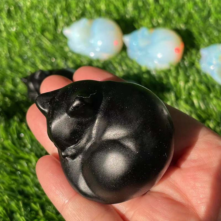 Sleeping cat sculpture crafted from natural stone, 3D animal figurine, ideal for garden or desk