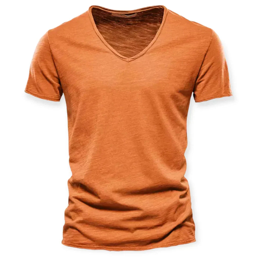 Close-up of fabric on men's comfort V-neck t-shirt, a soft everyday short sleeve top for casual wear.