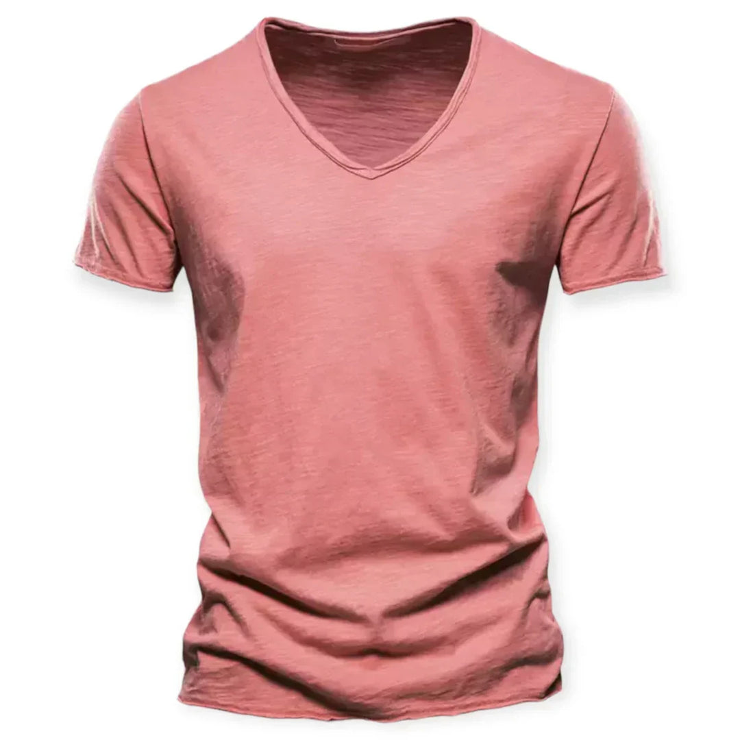 Man wearing a comfortable men's V-neck t-shirt, a versatile short sleeve top for casual everyday fashion.