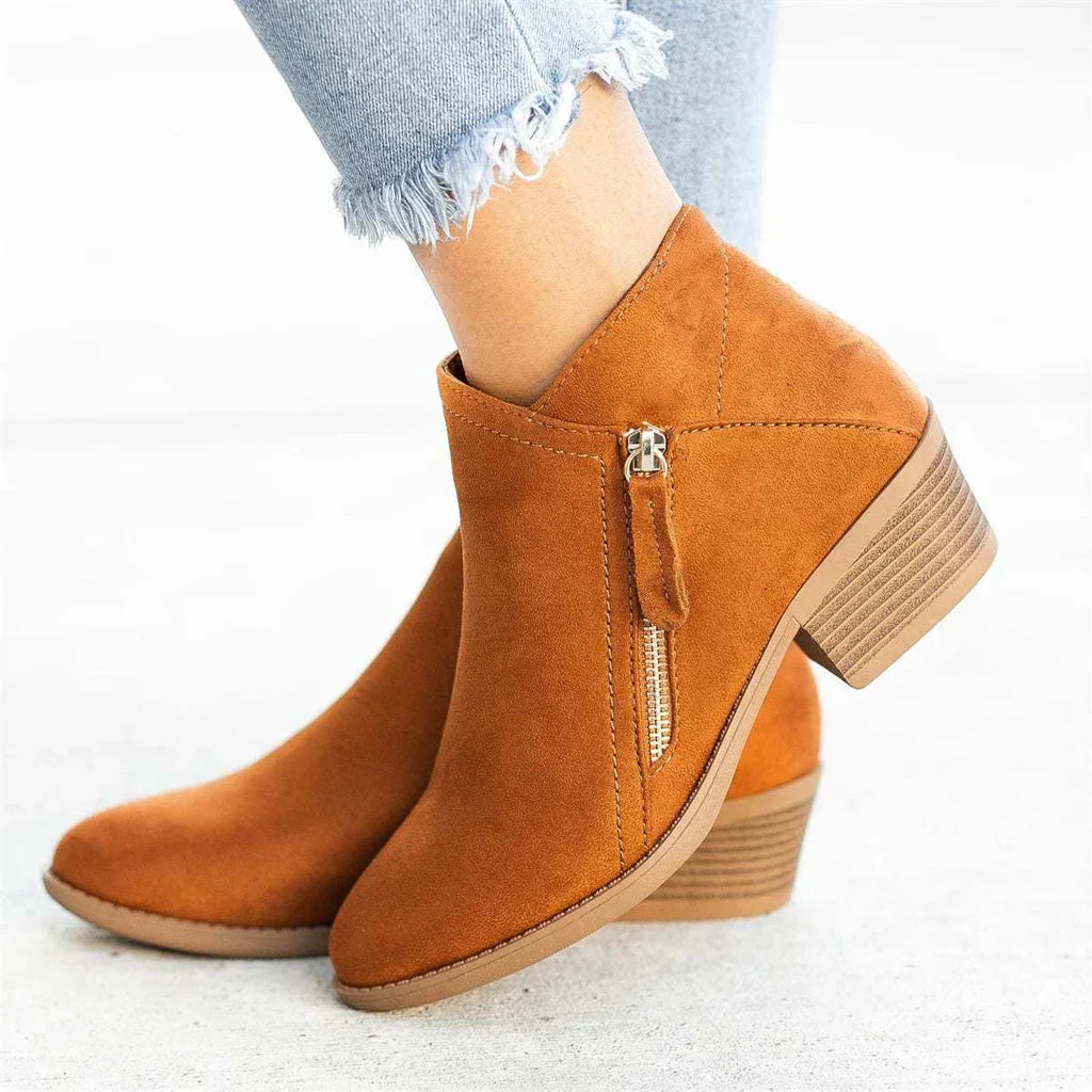 Pair of New Women's Fashion Heel Boots with practical zip closure, essential fall & winter footwear