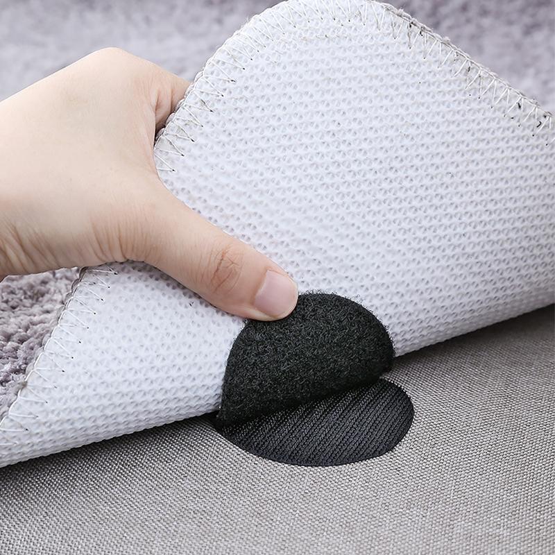 Pack of multi-surface rug grippers and carpet anchors for enhanced household safety.