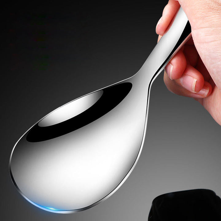 Non-stick stainless steel rice spoon with a comfortable handle for kitchen use and serving