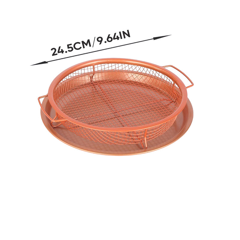 Nonstick air fryer basket next to raw ingredients, suitable for a healthy kitchen