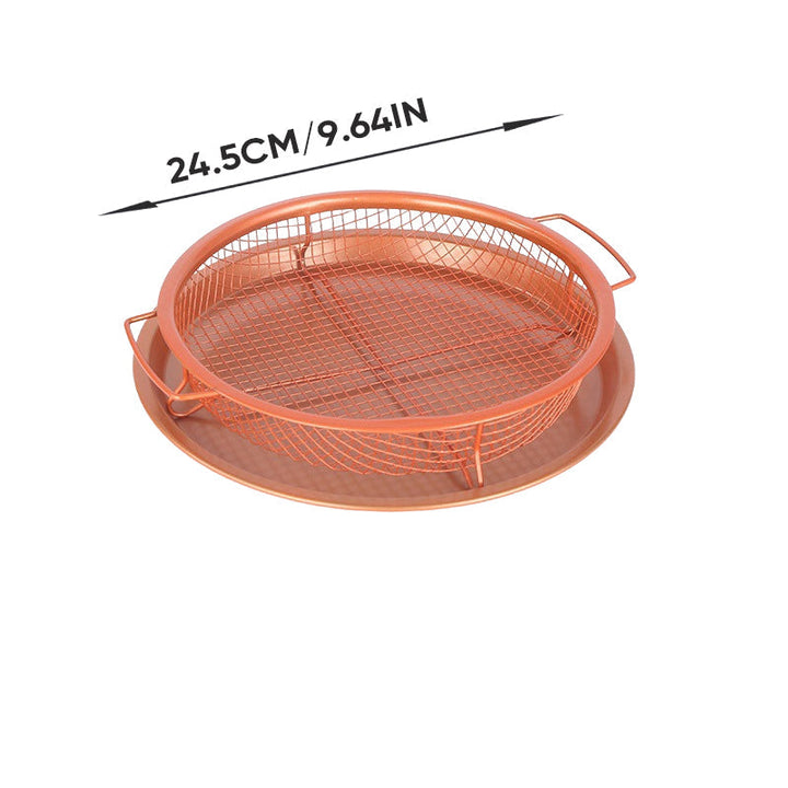 Nonstick air fryer basket next to raw ingredients, suitable for a healthy kitchen