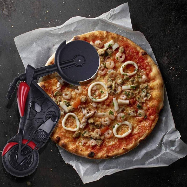 Novelty kitchen gadget: bicycle pizza cutter with red frame and two functional stainless steel blades