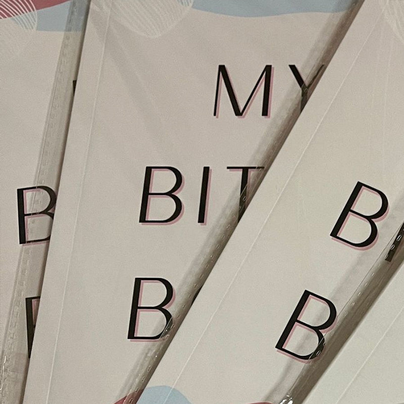 Stack of adult stress relief journals, perfect for self-care and gratitude