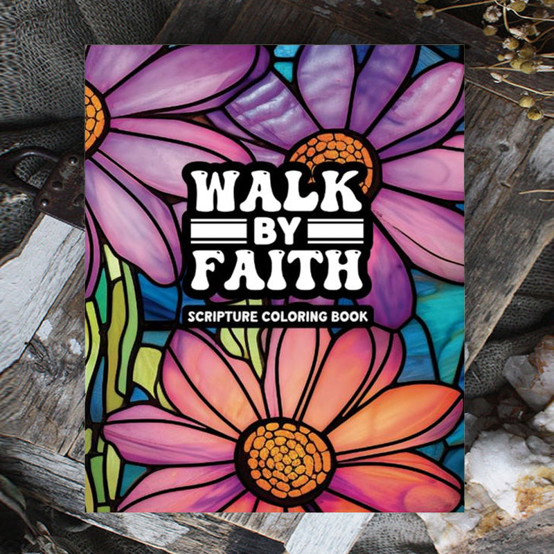 Detailed shot of an adult coloring book page depicting a serene landscape with an uplifting Bible verse.