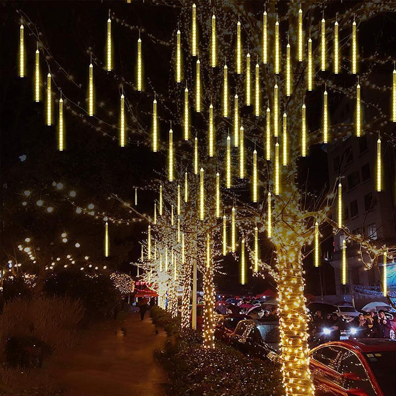 Cascading LED meteor lights for outdoor use, resembling falling rain, ideal for festive decor.