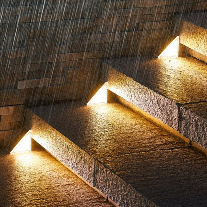 Energy-efficient LED solar step lights, ideal for outdoor stairs, pathways, and deck lighting