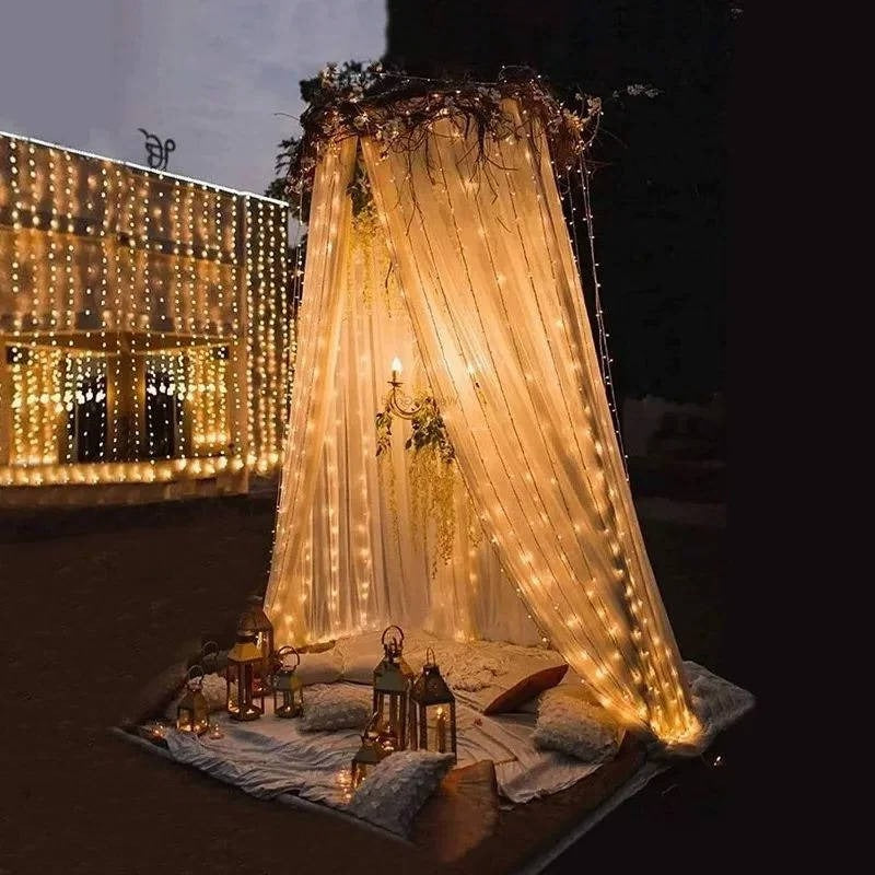 Multicolor outdoor solar curtain lights for festive backyard decor. Weatherproof LED fairy lights, no wiring needed.