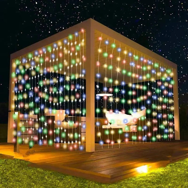 Weatherproof solar curtain lights for outdoor use. Warm white LED fairy lights, energy-saving and automatic.