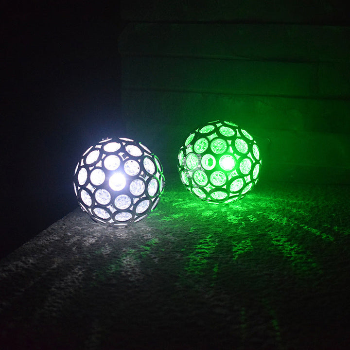 Solar powered LED hanging lantern, showcasing its automatic dusk-to-dawn sensor feature.