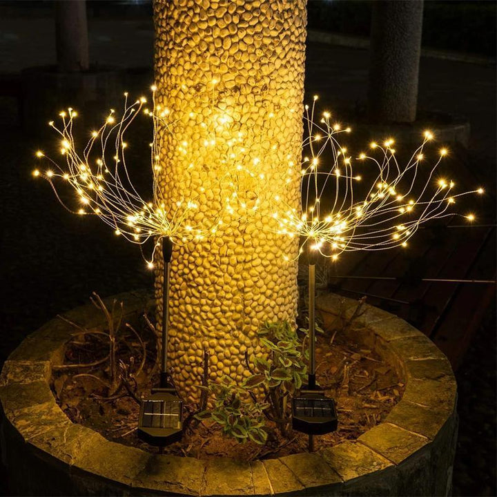 Close-up of solar firework garden light, 120 LED copper wires, starburst design, outdoor decor
