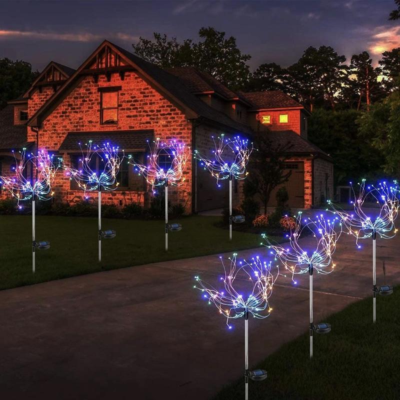 Pathway illuminated by a set of solar LED firework lights, warm glow, waterproof garden decor