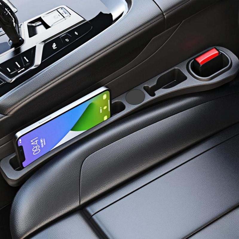 Car seat gap filler in a car, preventing items from falling between the seat and console.