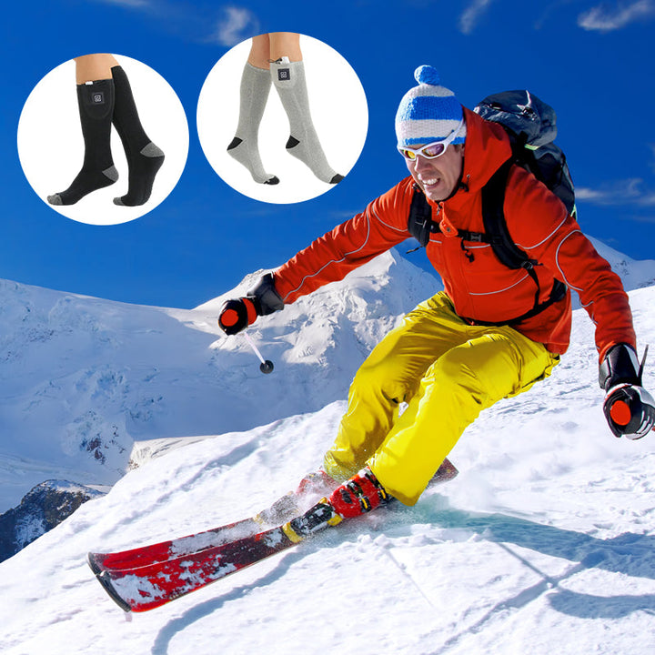 Pair of black unisex electric heated socks, perfect for skiing and cold weather sports.