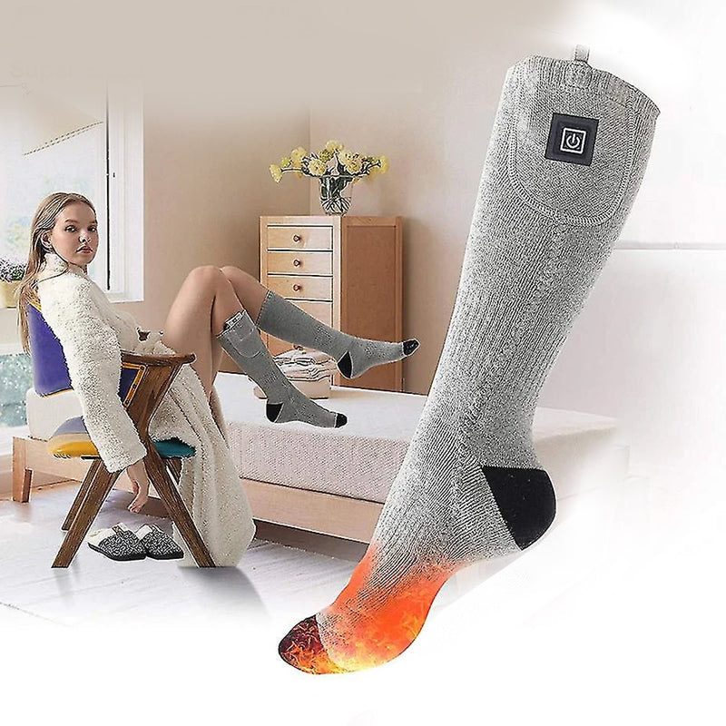 Unisex heated socks laid flat, displaying the soft fabric and design for comfort.