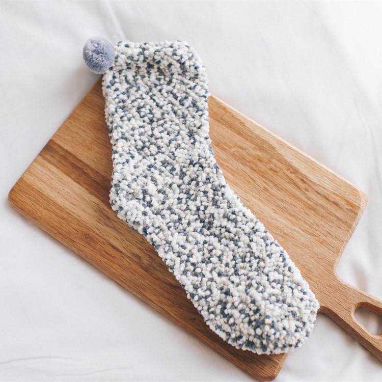Women's apparel: fluffy cupcake slipper socks, a comfy and stylish winter accessory for home.