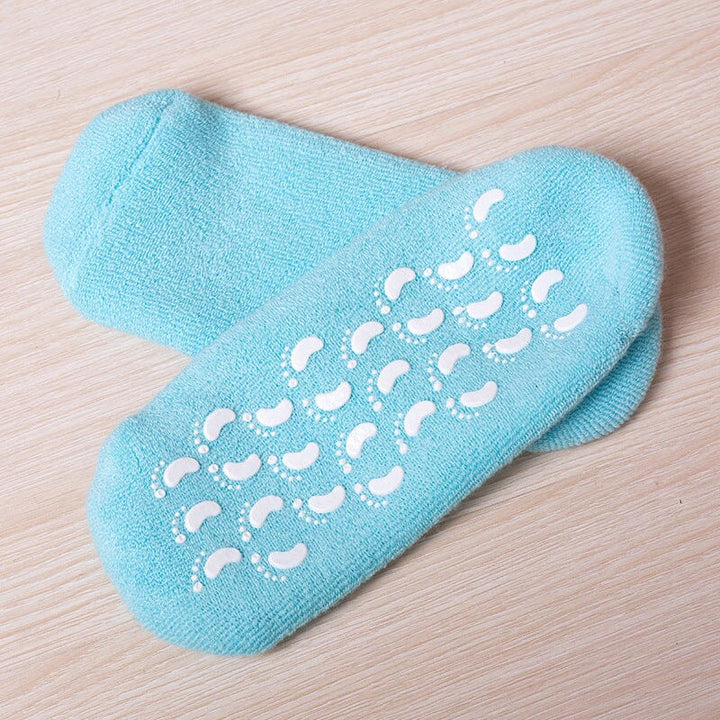 Set of unisex moisturizing socks in various colors, offering stylish foot care and skin softening options.