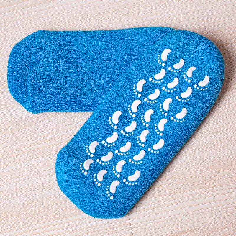 Unisex moisturizing socks folded neatly, ready for use as effective pedicure supplies and a dry feet remedy.