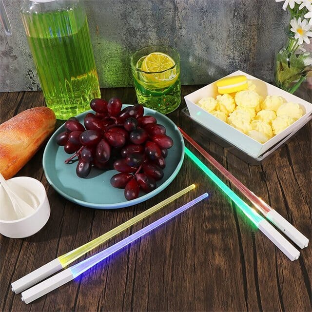 Set of assorted color Lightsaber LED chopsticks, a unique and reusable kitchen novelty gift.