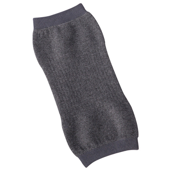 Arrangement of unisex knee warmers, highlighting their thermal cashmere quality for joint support