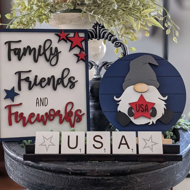 Rustic Americana tiered tray decor featuring flags, stars, & a 'Home of the Brave' sign.
