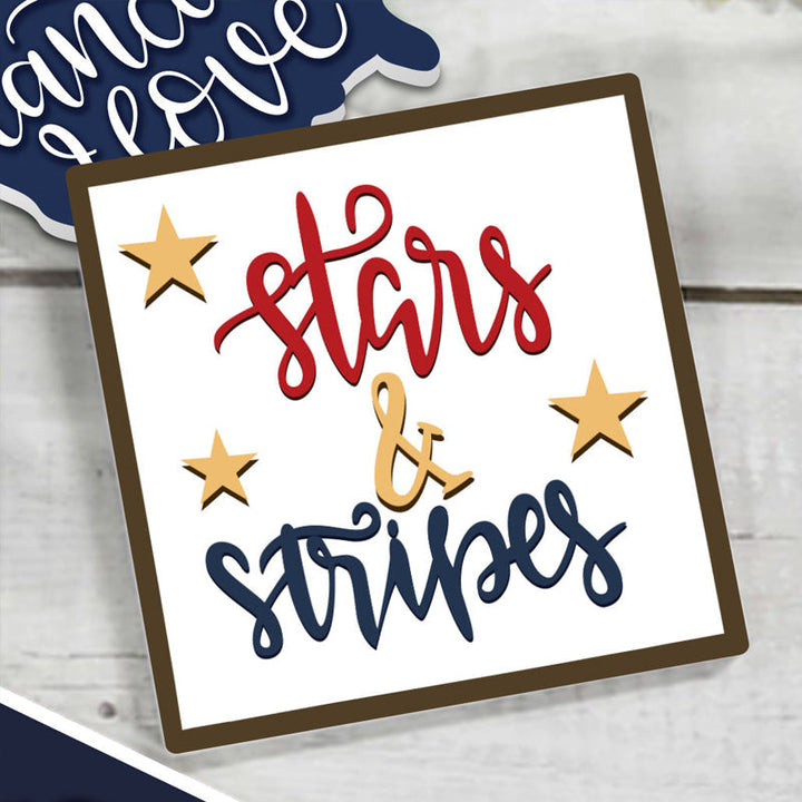 Collection of 4th of July patriotic decor pieces for a tiered tray, including mini signs & beads.