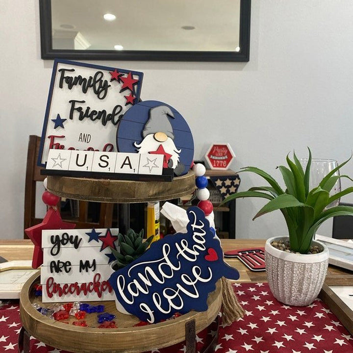 Wooden 'USA' letters & a small flag decor piece from an Americana tiered tray set.